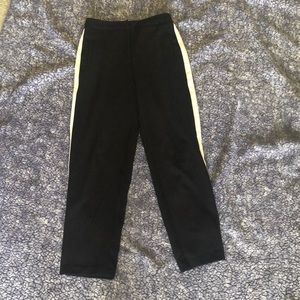 Black pants with white stripes